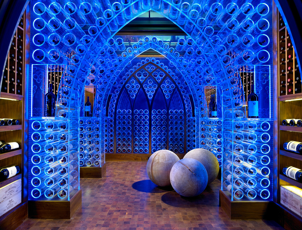 Example of a large trendy orange floor wine cellar design in Nashville with storage racks