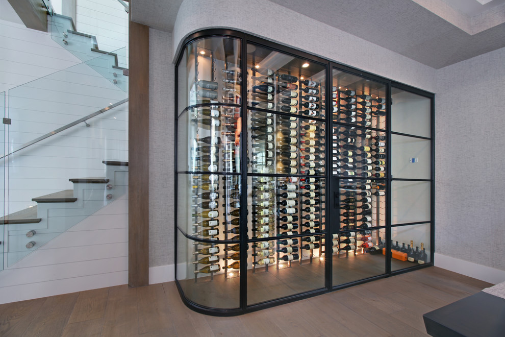 Inspiration for a transitional wine cellar remodel in Orange County