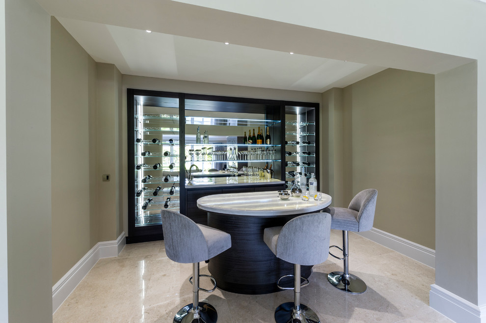 Example of a small trendy wine cellar design in Surrey with storage racks