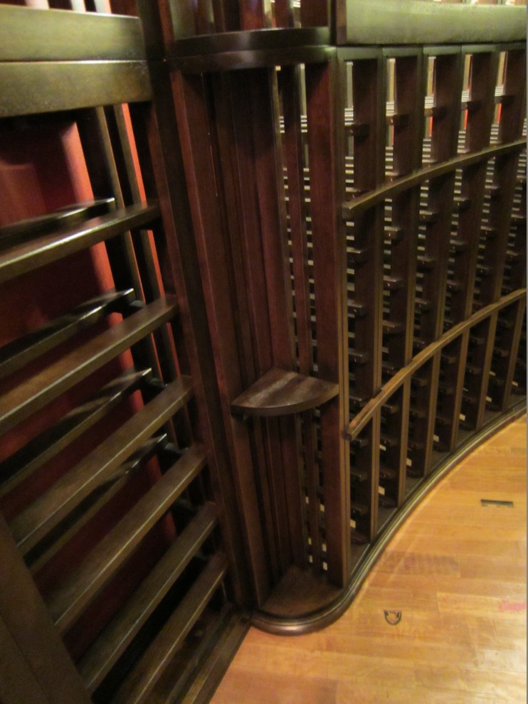 Radius Base Molding curves with the wine racks; Custom Wine Cellar TX