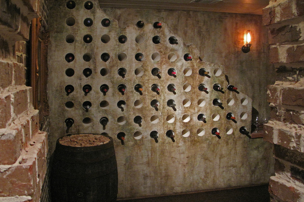 Inspiration for a rustic wine cellar in Atlanta with storage racks.