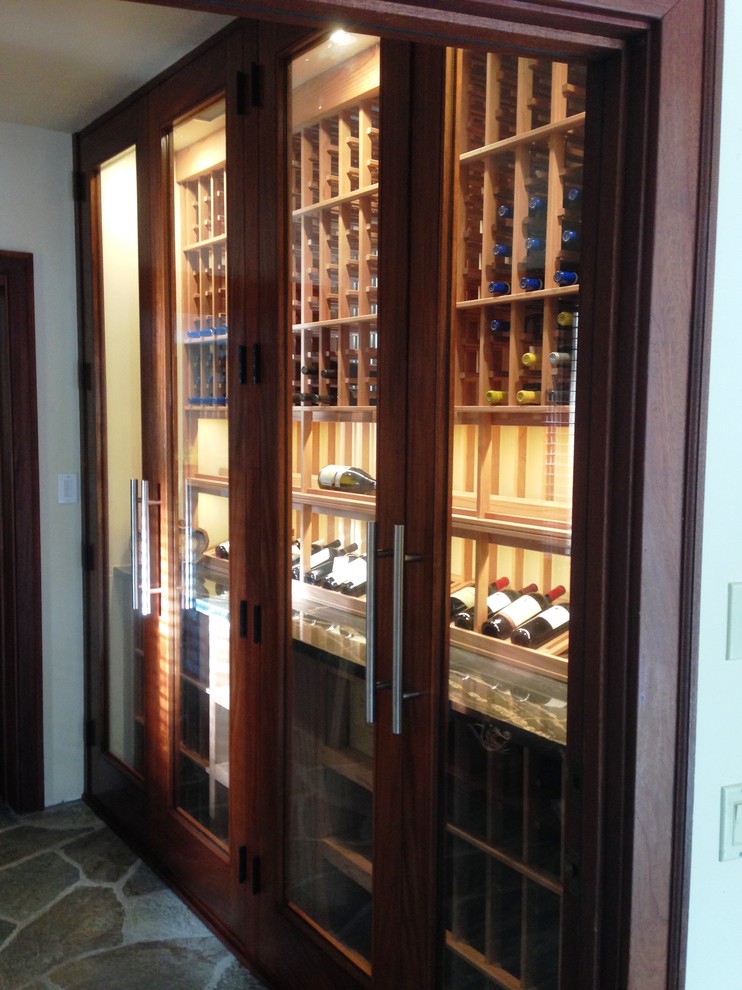 Wine cellar - small traditional wine cellar idea in San Diego