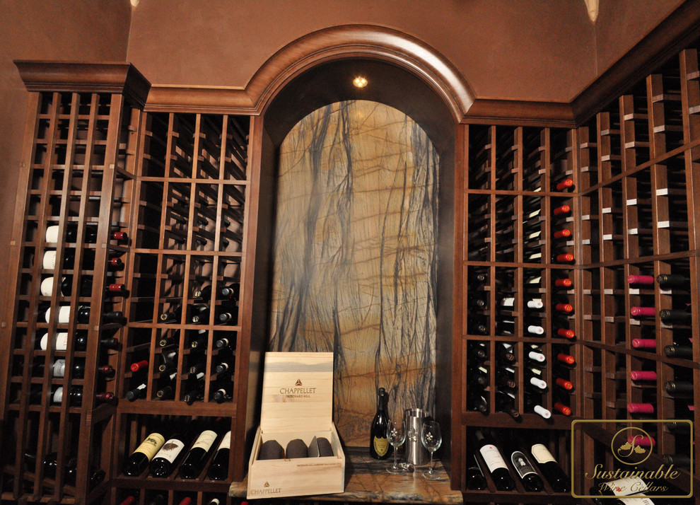 Example of a mid-sized classic wine cellar design in San Diego with storage racks