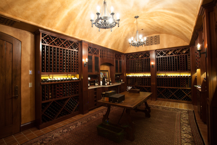 Example of a tuscan wine cellar design in San Diego
