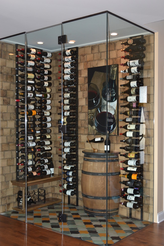 Inspiration for a contemporary medium tone wood floor and multicolored floor wine cellar remodel in Milwaukee with display racks
