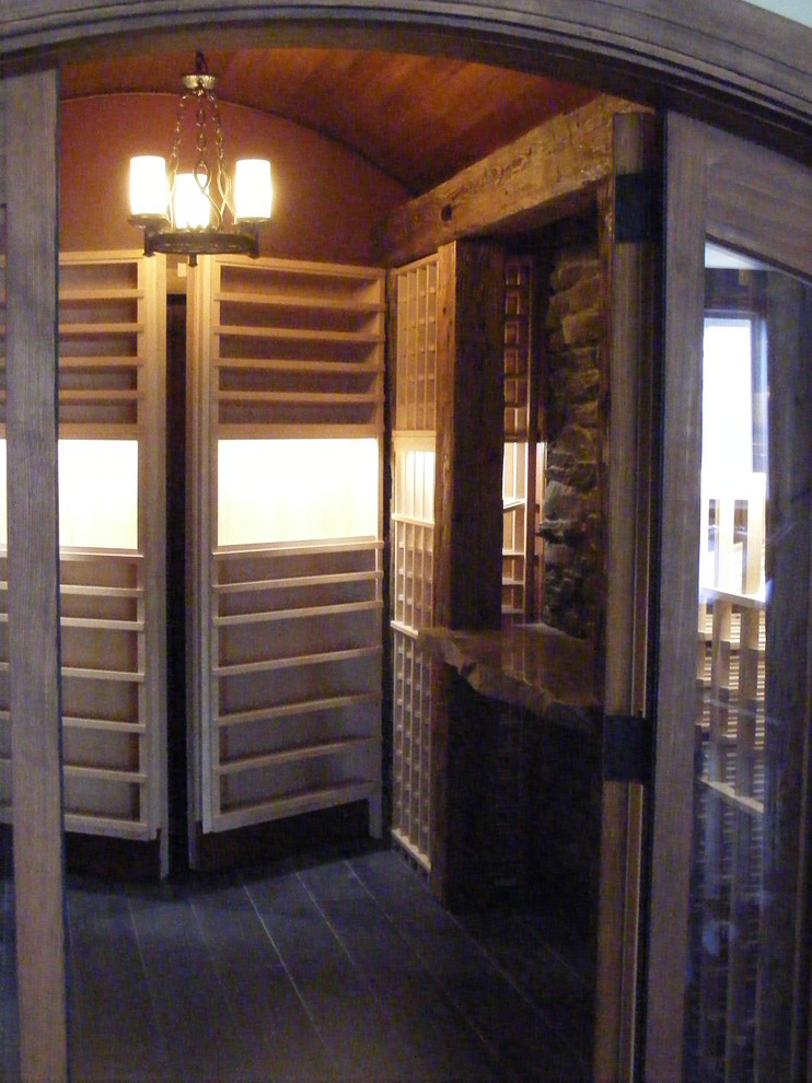 Wine cellar - traditional wine cellar idea in Toronto
