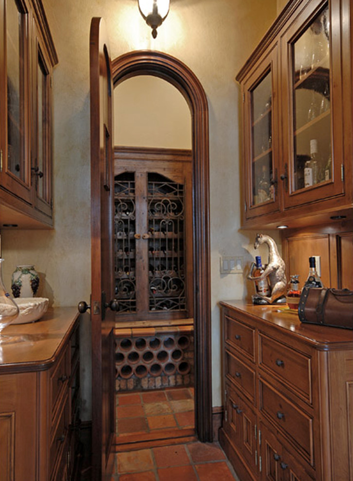 This is an example of a mediterranean wine cellar in Miami.