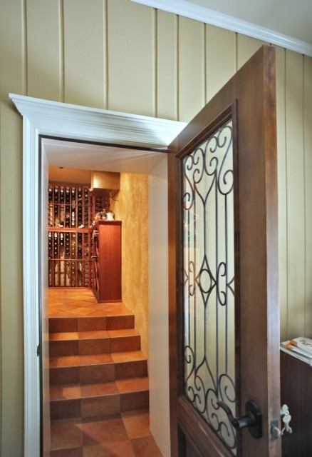 Inspiration for a large timeless ceramic tile wine cellar remodel in DC Metro with storage racks