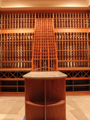 Small elegant wine cellar photo in Los Angeles with storage racks