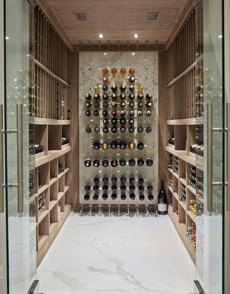 Example of a trendy wine cellar design in Toronto