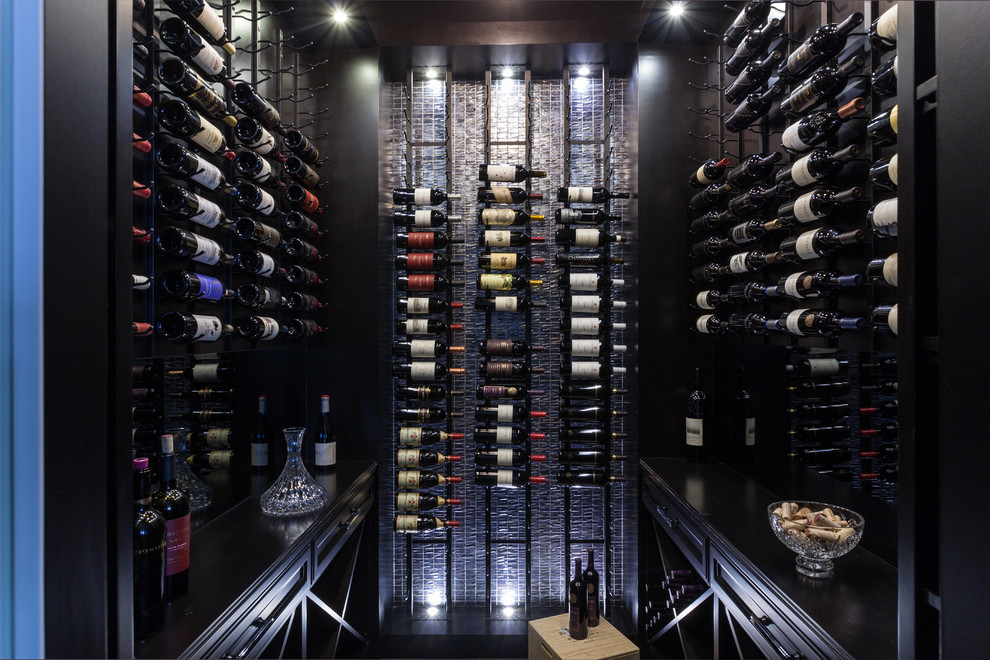 Design ideas for a contemporary wine cellar in Miami with storage racks.