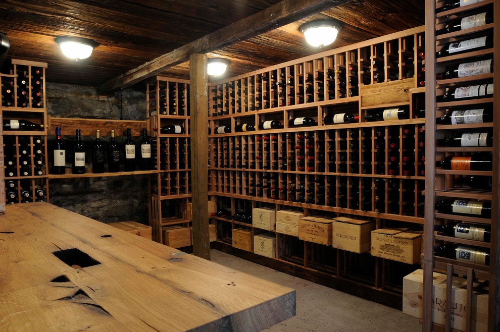 Wine cellar - rustic wine cellar idea in Bridgeport