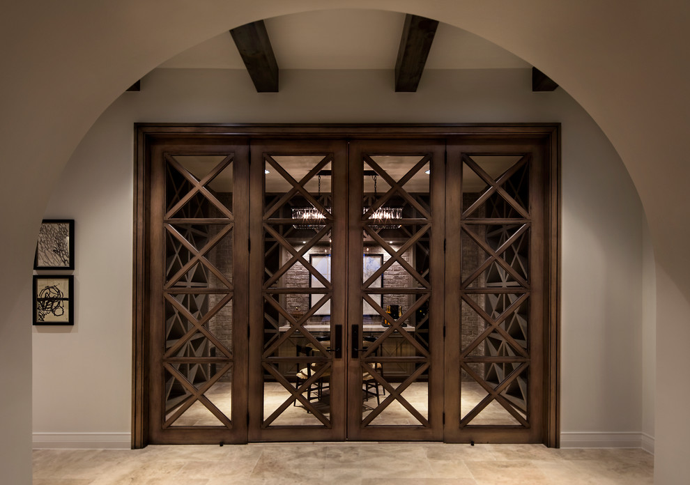 Example of a large transitional wine cellar design in Austin with diamond bins