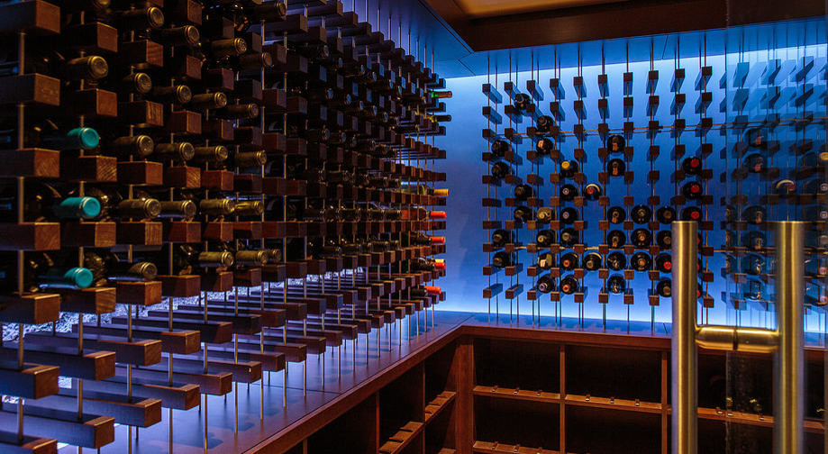 Photo of a medium sized contemporary wine cellar in Boston with storage racks.