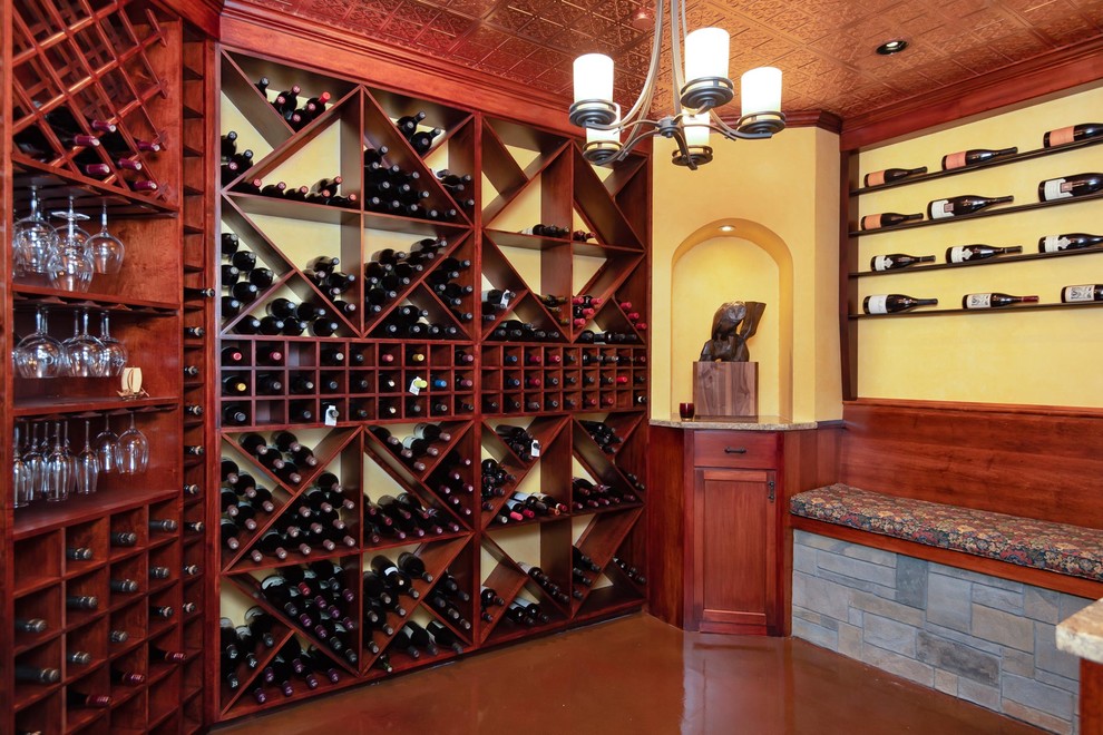 This is an example of a large rustic wine cellar in Portland.