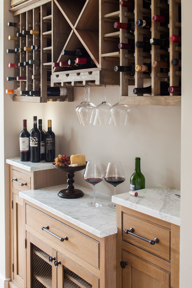 Small beach style wine cellar photo in New York