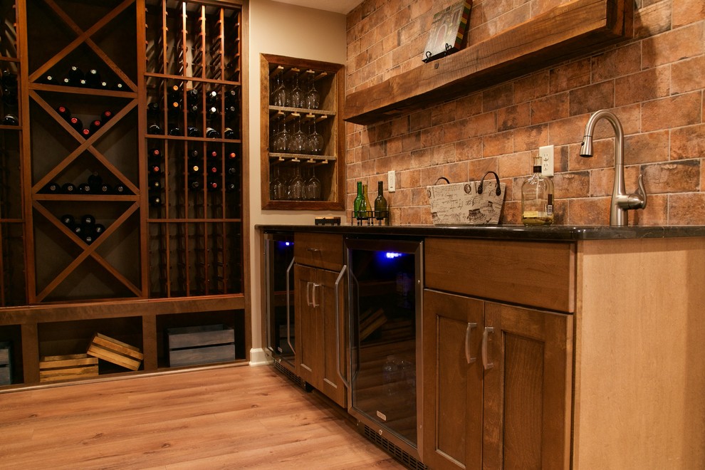 Mountain style wine cellar photo in Cleveland