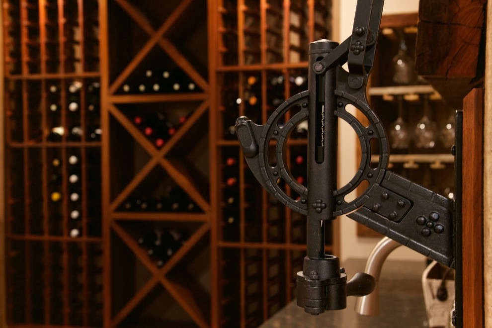 This is an example of a rustic wine cellar in Cleveland.