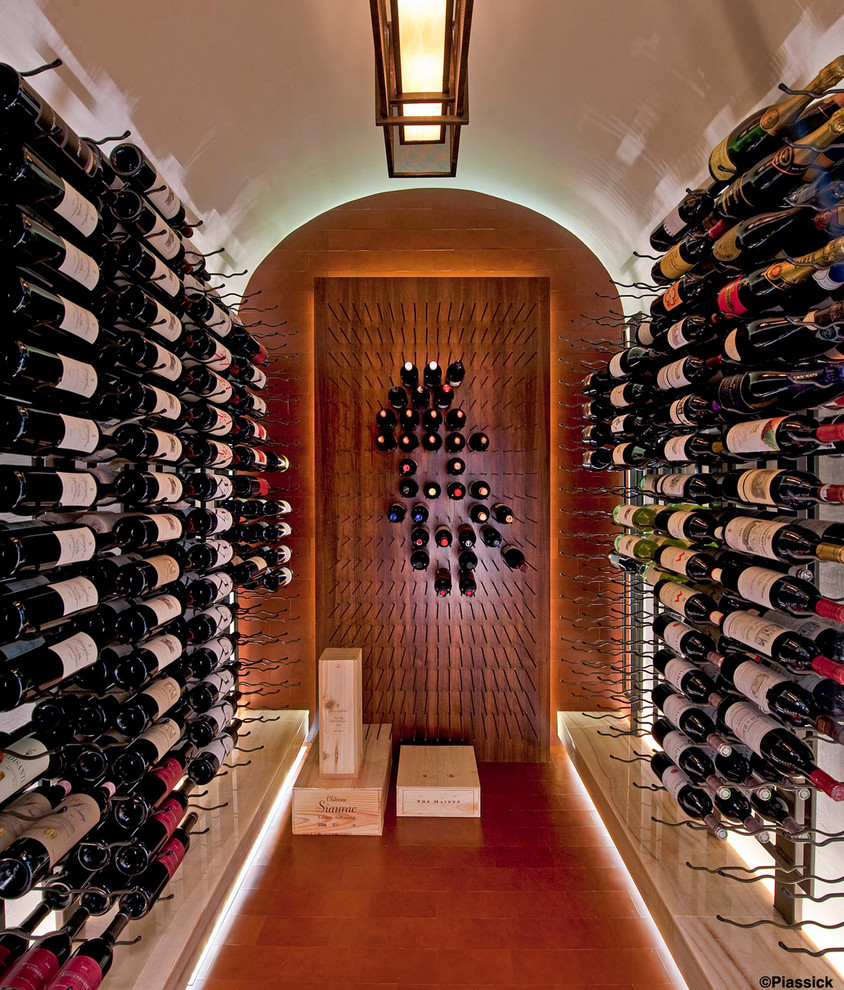 Photo of a mediterranean wine cellar in Dallas.