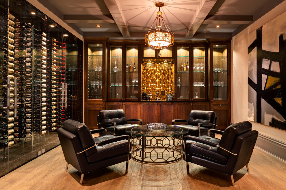 Design ideas for a large traditional wine cellar in Vancouver with medium hardwood flooring, storage racks and beige floors.