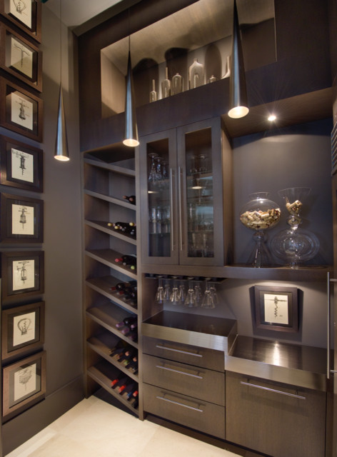 Photo of a small contemporary wine cellar in New York with porcelain floors, storage racks and beige floor.