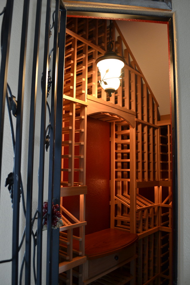 Design ideas for a medium sized traditional wine cellar in Sacramento with storage racks.