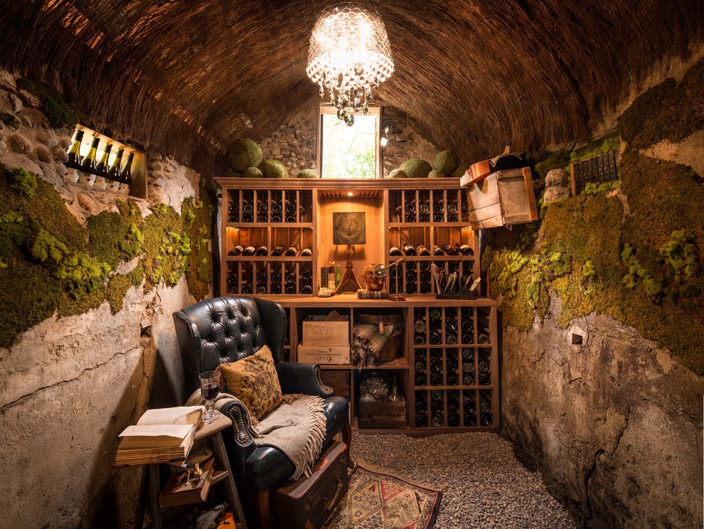 Wine cellar - small rustic wine cellar idea in Los Angeles