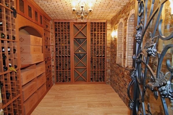 Photo of a mediterranean wine cellar in Orange County.