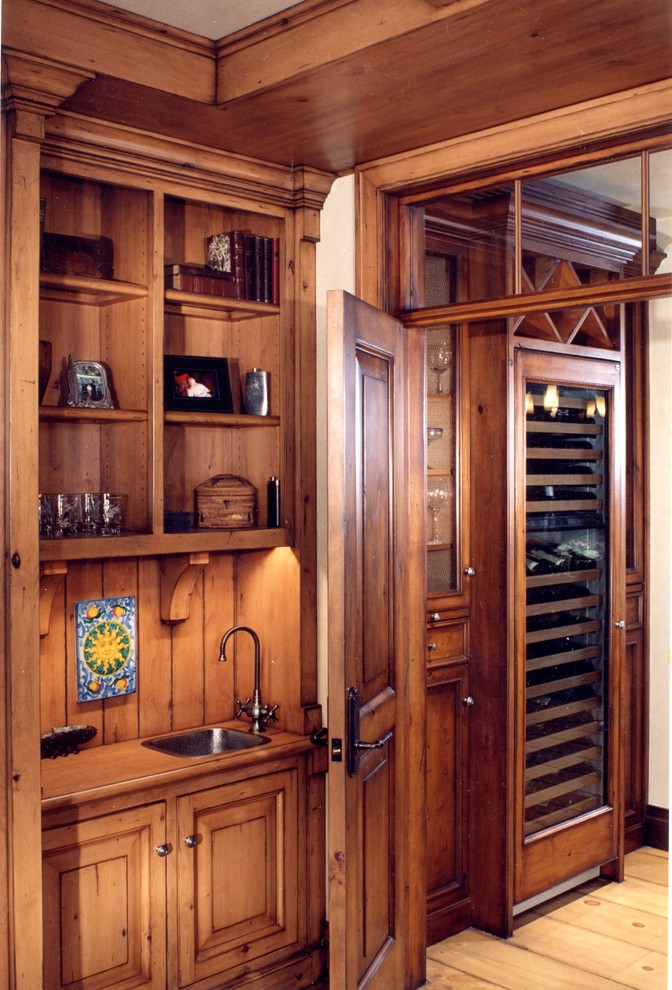 Inspiration for a craftsman wine cellar remodel in Orange County