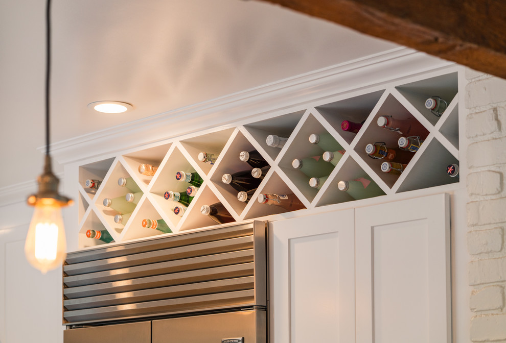Inspiration for a small midcentury wine cellar in Santa Barbara with storage racks.