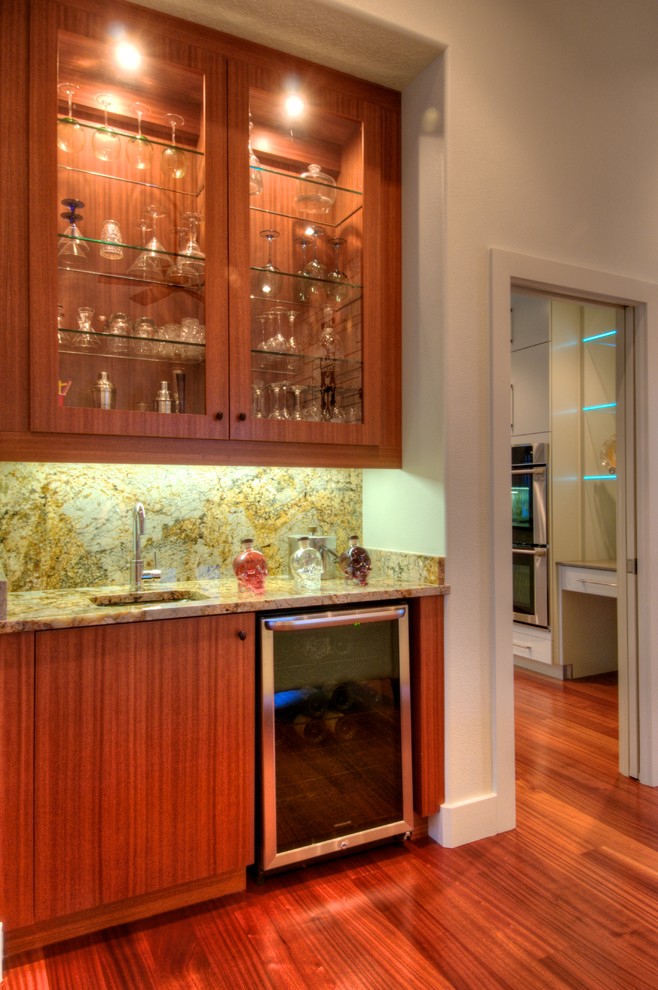 Inspiration for a contemporary home bar remodel in Tampa
