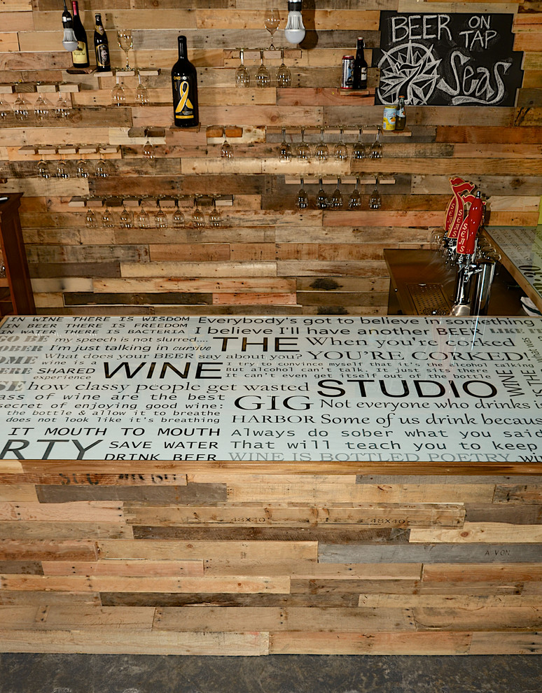 Large urban porcelain tile wine cellar photo in Seattle with display racks