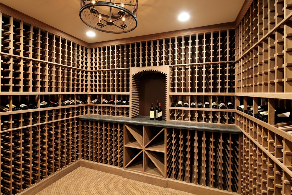 Inspiration for a mid-sized timeless wine cellar remodel in San Francisco with storage racks