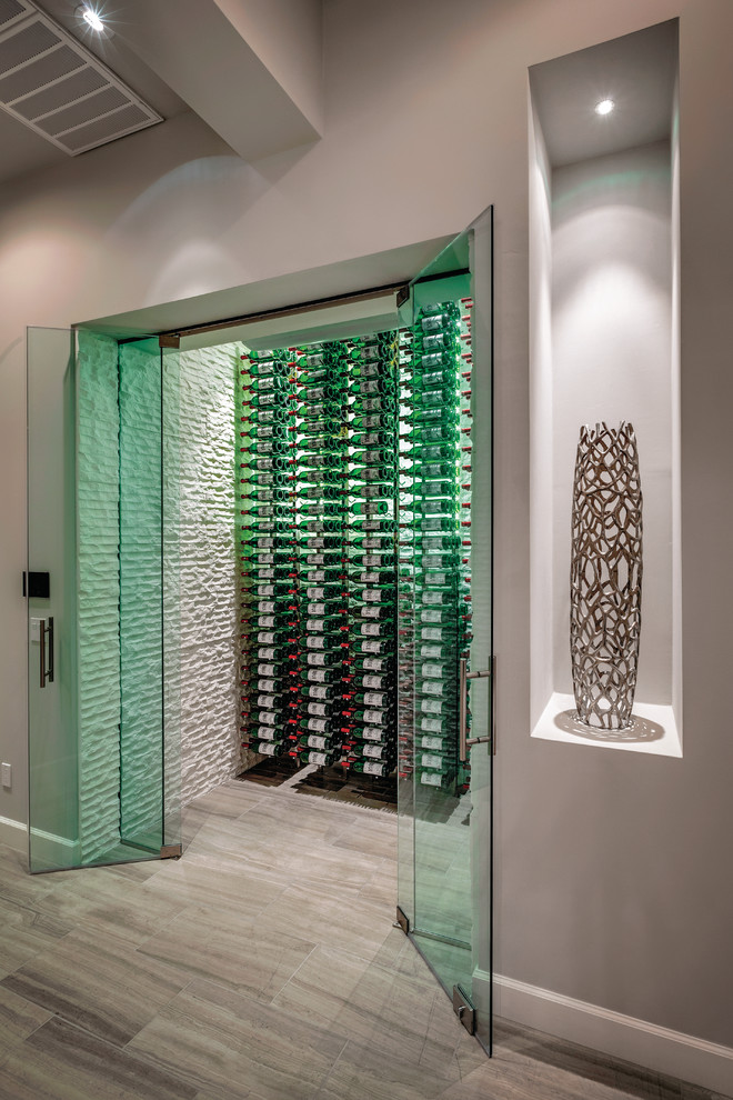 This is an example of a contemporary wine cellar in Philadelphia with storage racks.