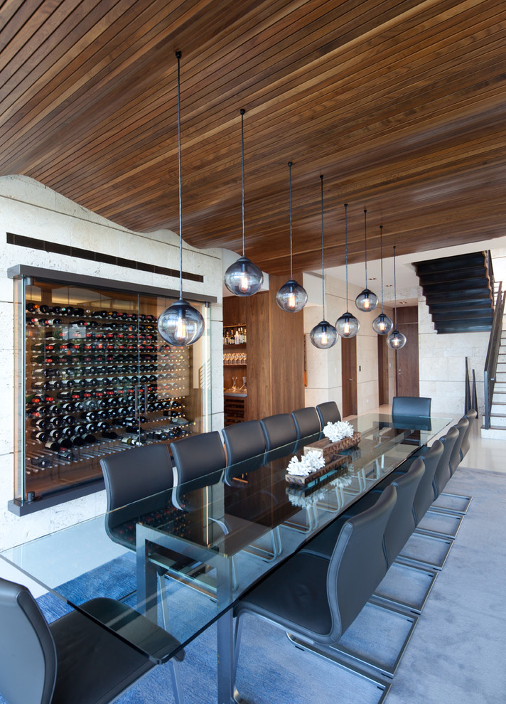 Photo of a contemporary wine cellar in Vancouver with storage racks.