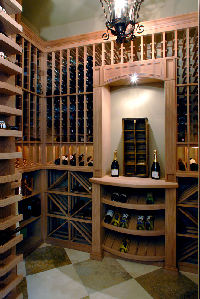 Design ideas for a traditional wine cellar in Toronto with storage racks.