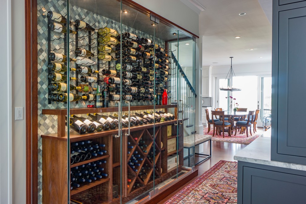 Photo of a small traditional wine cellar in Los Angeles with display racks.
