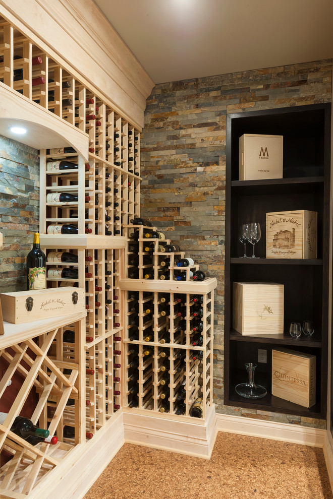 Traditional Wine Cellar w/ Stone Accent Walls, Wine Glass Storage, & A