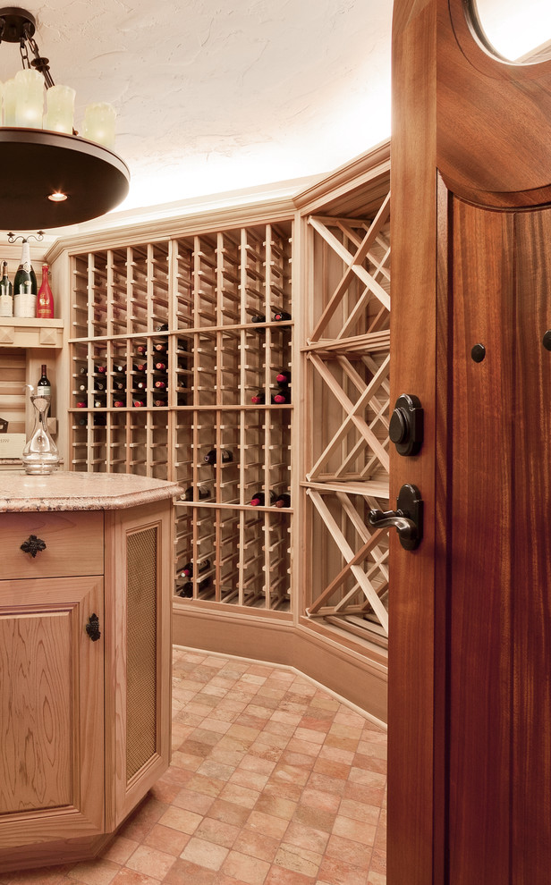 This is an example of a mediterranean wine cellar in Milwaukee.