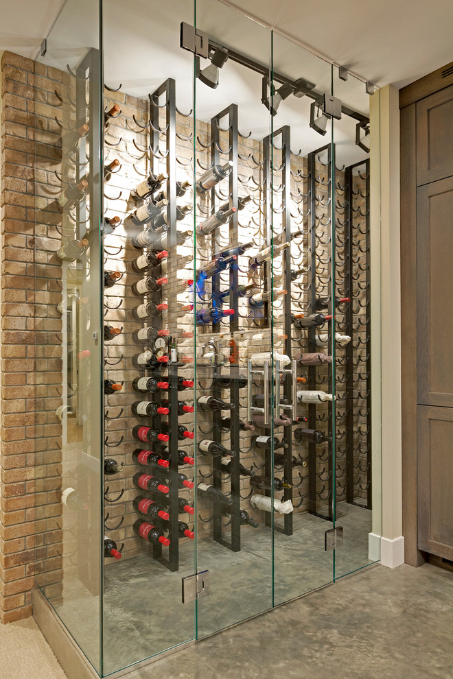 Contemporary wine cellar in Minneapolis with storage racks.