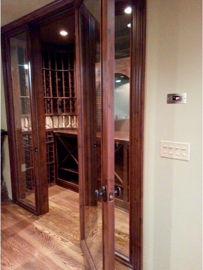 Example of a small classic wine cellar design in Atlanta with storage racks