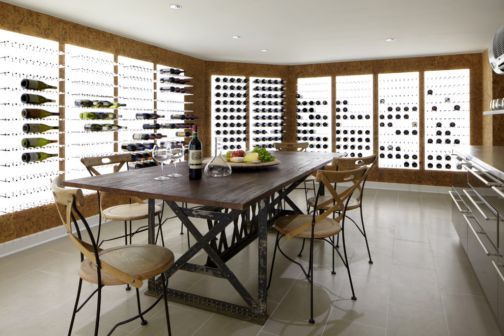 Example of a large trendy ceramic tile wine cellar design in New York with storage racks