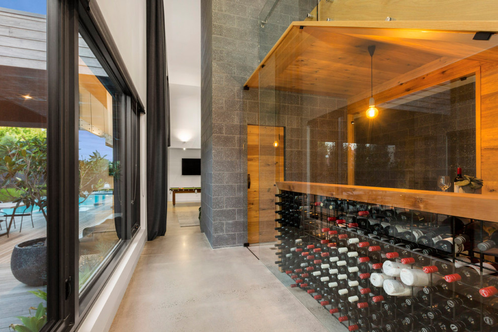 Example of a trendy wine cellar design in Melbourne