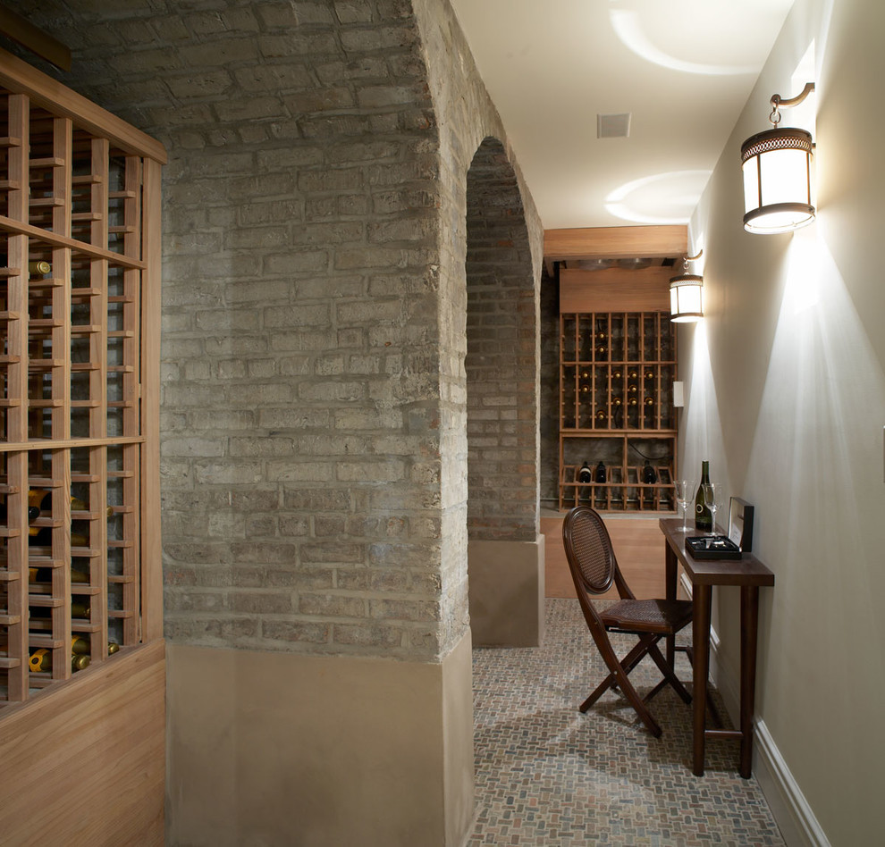 This is an example of a traditional wine cellar in New York with storage racks.