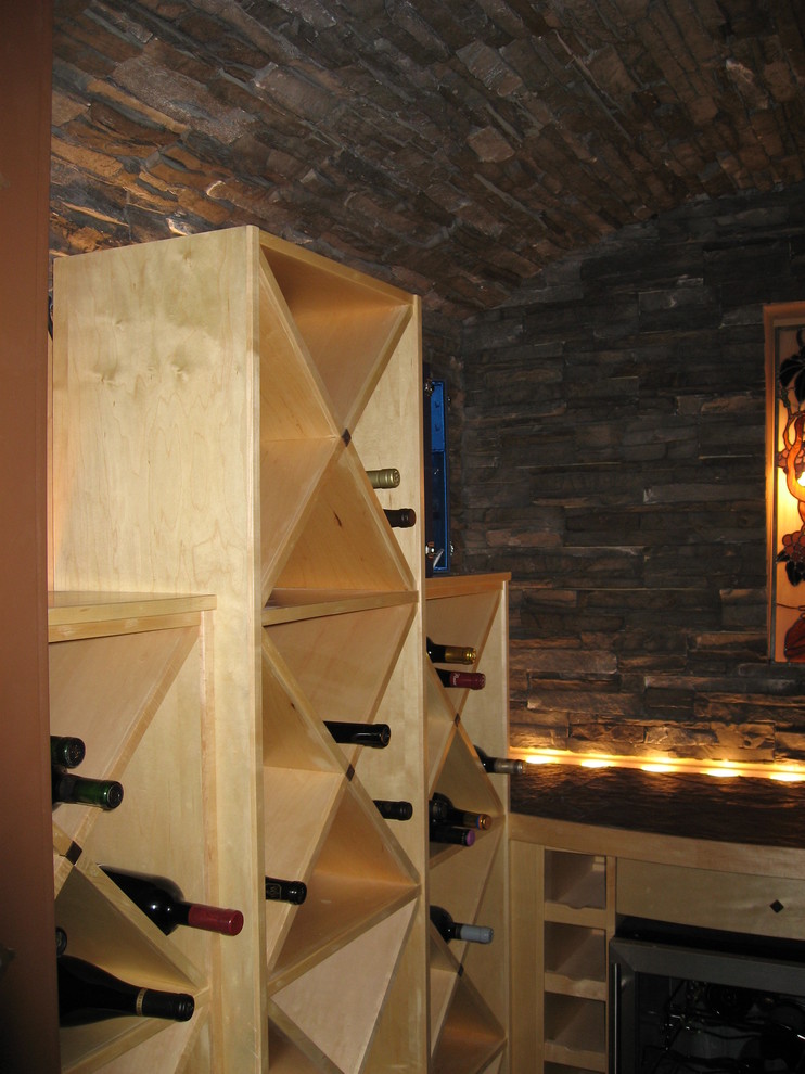 Inspiration for a contemporary wine cellar in Calgary.