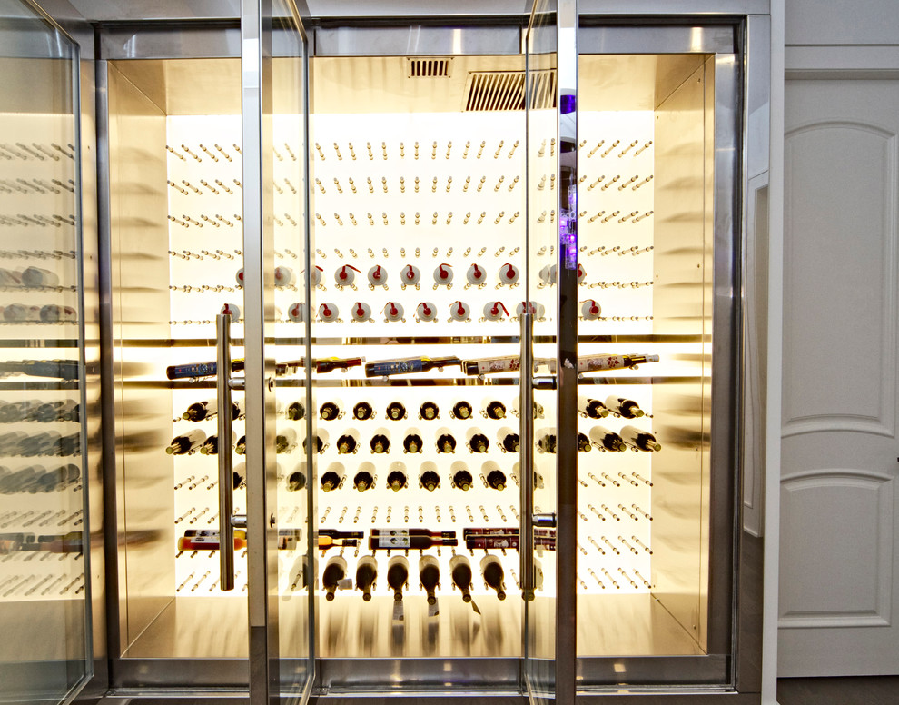Mid-sized minimalist wine cellar photo in Vancouver