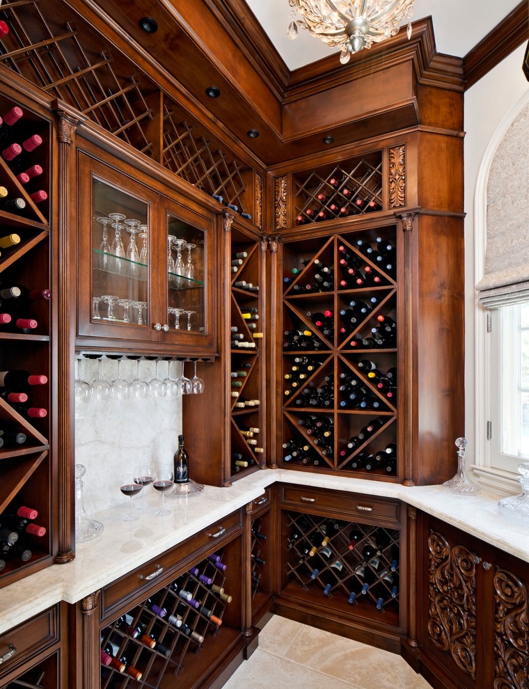 This is an example of a traditional wine cellar in Los Angeles with storage racks.