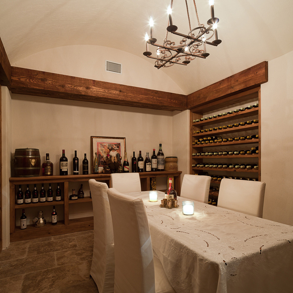 Photo of a traditional wine cellar in Atlanta with storage racks.