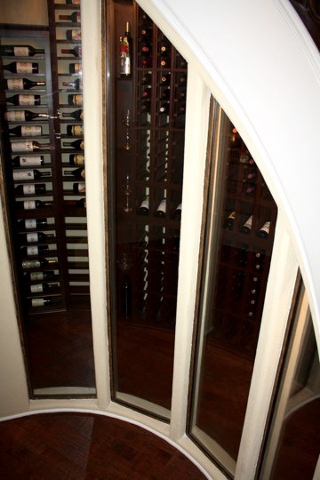 Inspiration for a small classic wine cellar in Dallas with storage racks.