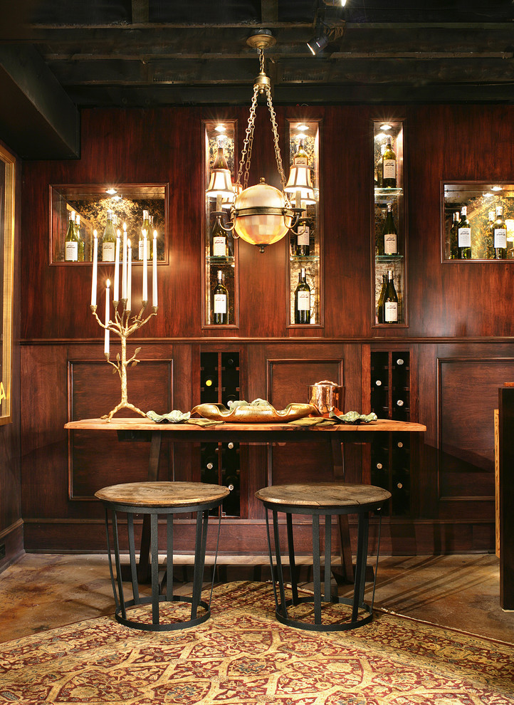 Elegant wine cellar photo in New York with display racks